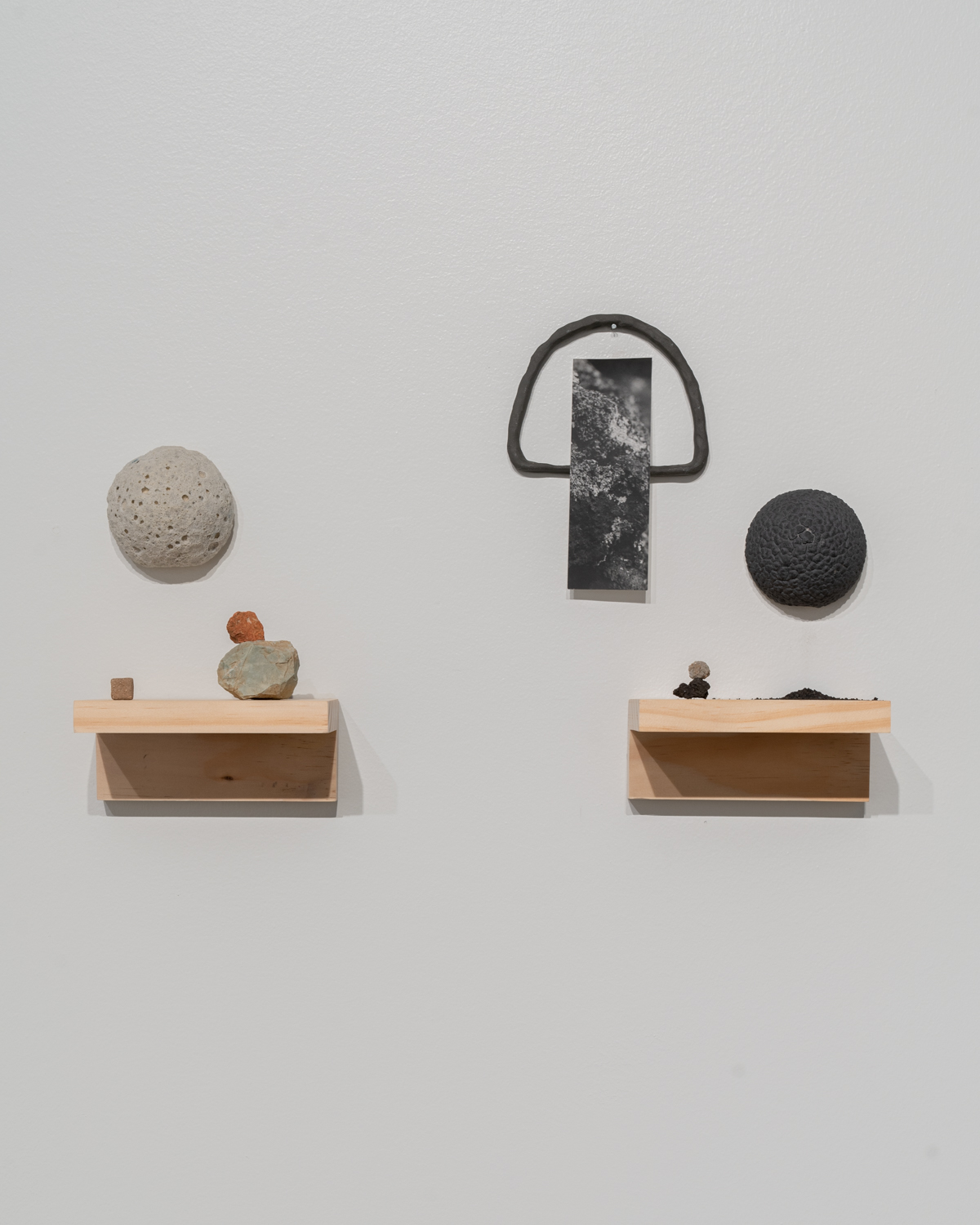 Ashley Saldana, Subtle Echoes, Stoneware, found objects, wood, soil